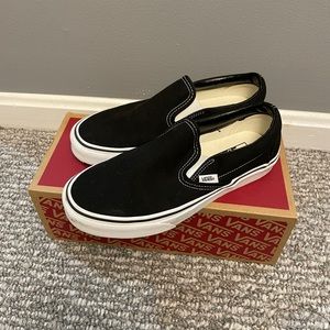 Vans Black Slip Ons